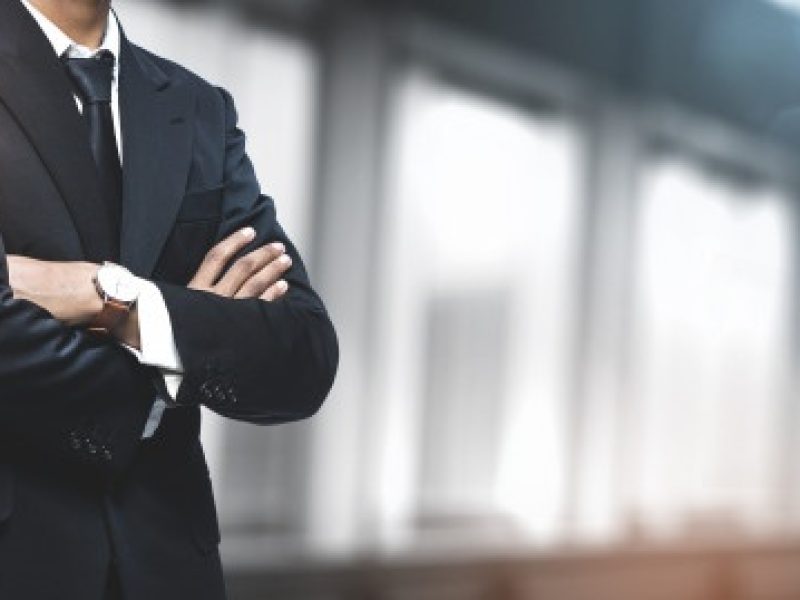 asian-businessman-blurred-office-copyspace_1379-3835