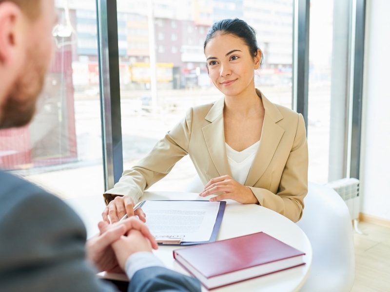 Successful Businesswoman in Meeting with Client